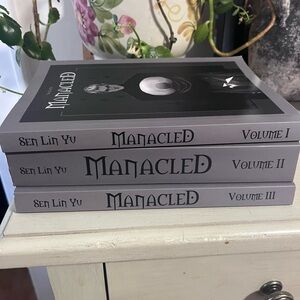 Manacled - lightly used books